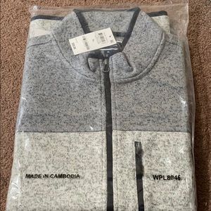 XL new in plastic sweater vest